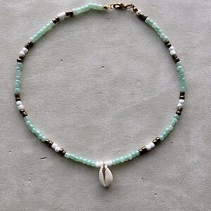 Beach-like necklace/choker with REAL Cowrie shell!! Gold clasps.